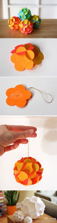 3-D paper ball ornaments with instructions and printable templates for download, by How About Orange: Made from 12 slotted flower shapes that fit together to form a sphere. No adhesive needed; the only ingredient is paper.