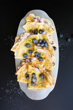 Lemon poppyseed crepes with blueberry cream cheese filling